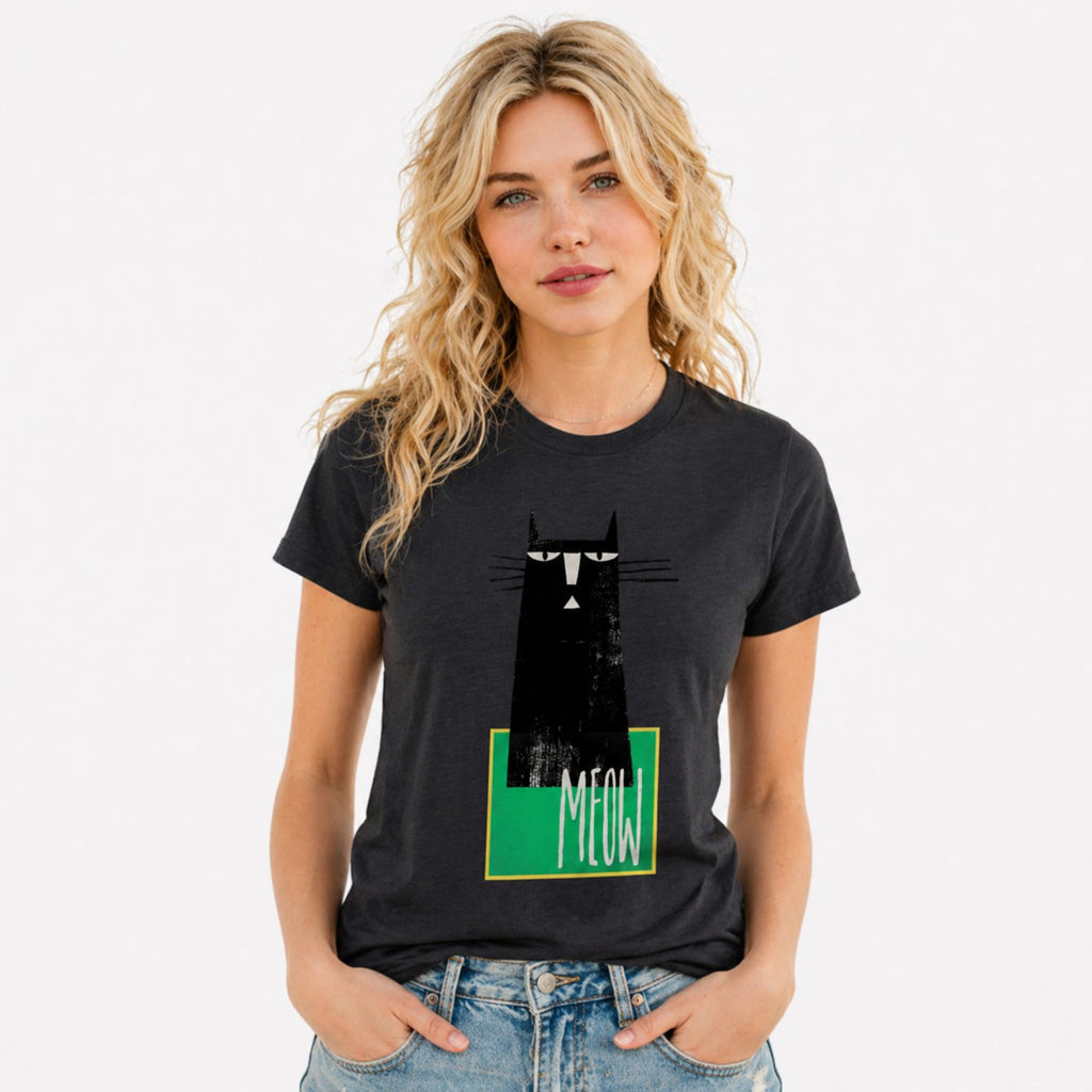 Woman wearing a black MEOW graphic t-shirt featuring minimalist cat artwork inspired by feline lovers and modern design.