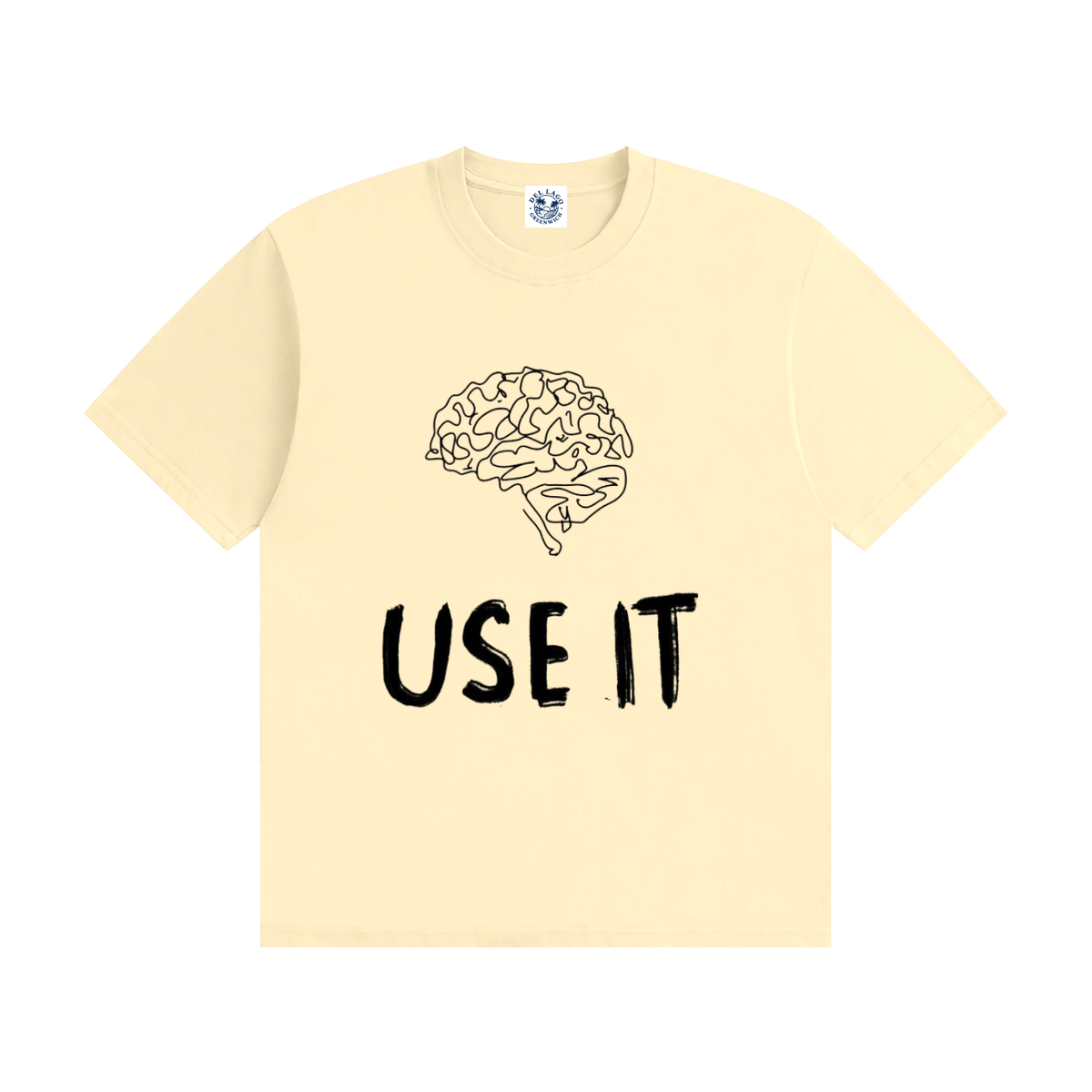 A pale yellow short-sleeve t-shirt with a black line art graphic of a brain above the text 'USE IT' in a distressed black font, displayed on a solid white background.