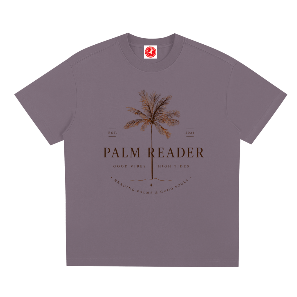 Gray Coastal graphic t-shirt featuring palm-themed artwork inspired by beach life, sunshine, and tropical escapes.