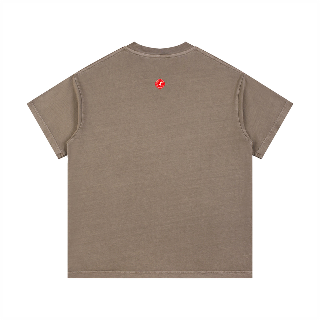 Brown Mona graphic t-shirt featuring artistic portrait-inspired artwork with a modern vintage aesthetic.