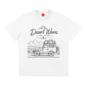 White Desert-inspired graphic t-shirt featuring artistic landscape artwork blending desert scenery with coastal influences.
