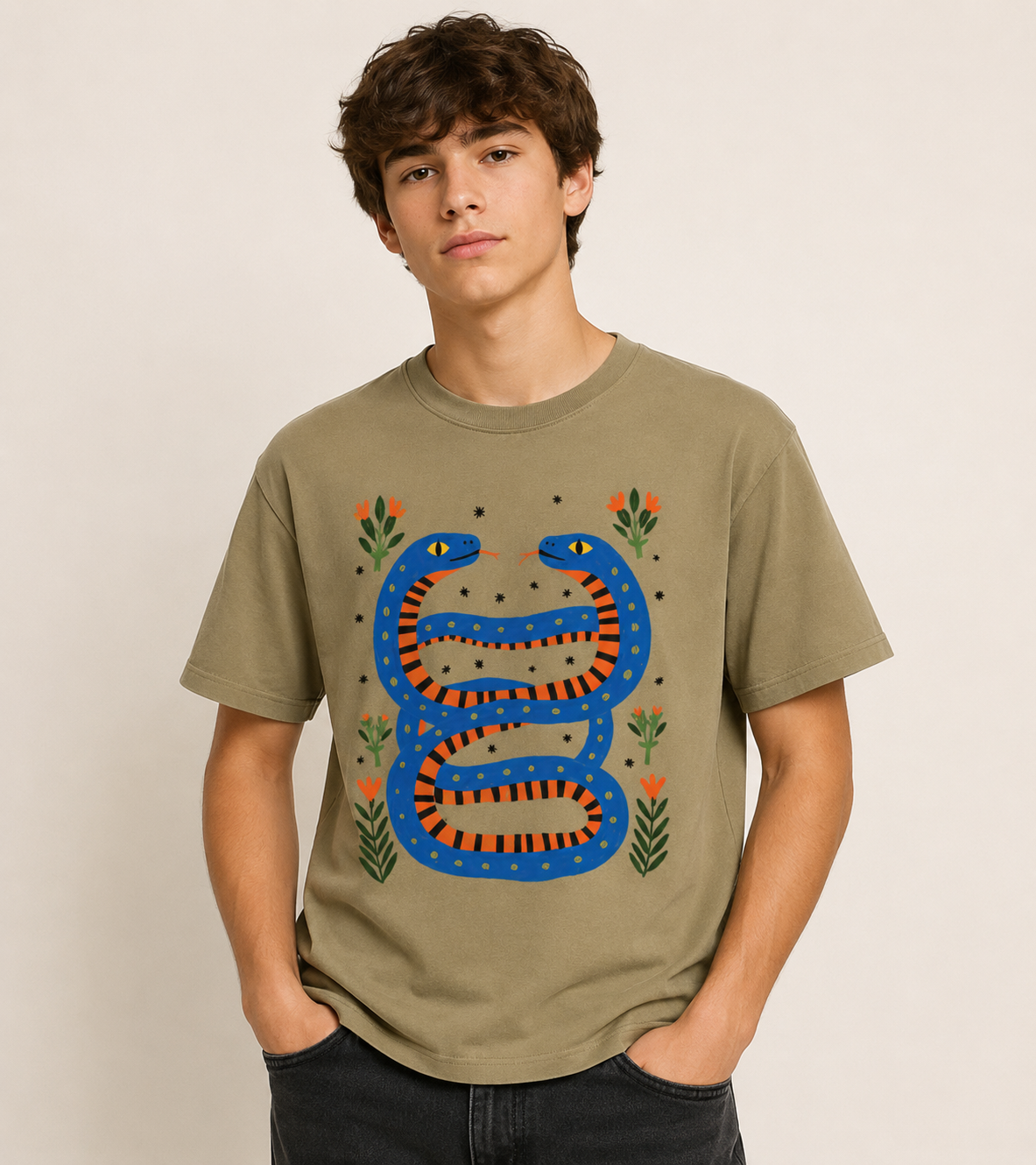Teen boy wearing the Twin Serpents graphic t-shirt 