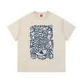 Beige tInk Tiger graphic t-shirt featuring bold tiger artwork inspired by wildlife and traditional ink illustration.