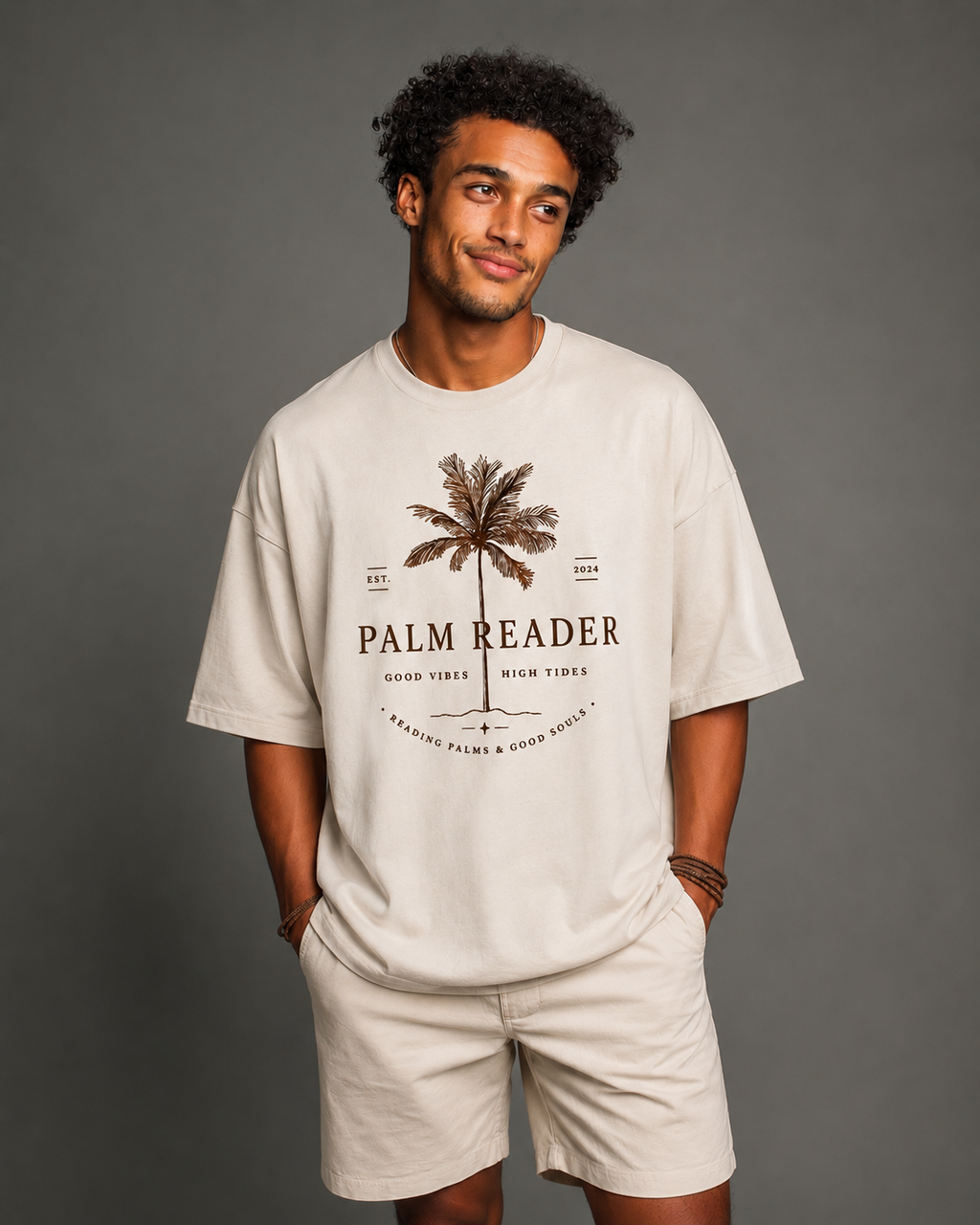 Palm Reader tee on a relaxed oversized fit with vintage coastal-inspired artwork and soft neutral tones — designed for laid-back days, open roads, and sun-faded moods.