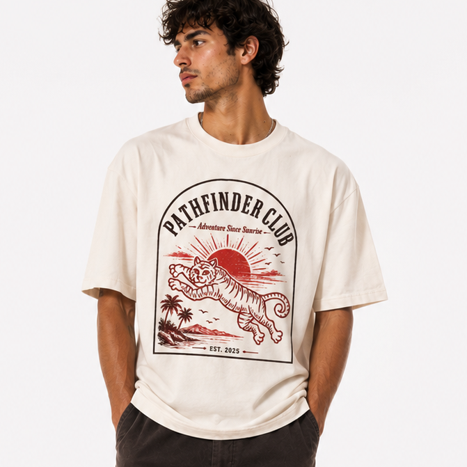 a man wearing a 'Pathfinder Club' t-shirt with a tiger design.