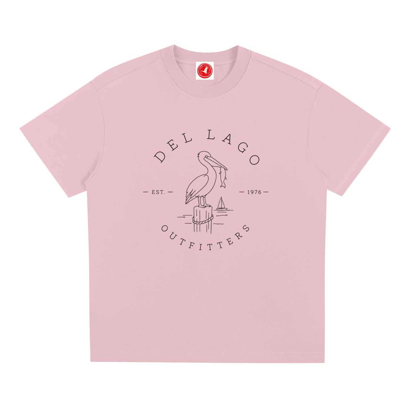Pink Pelican graphic t-shirt featuring original coastal bird artwork inspired by beach living and nature.