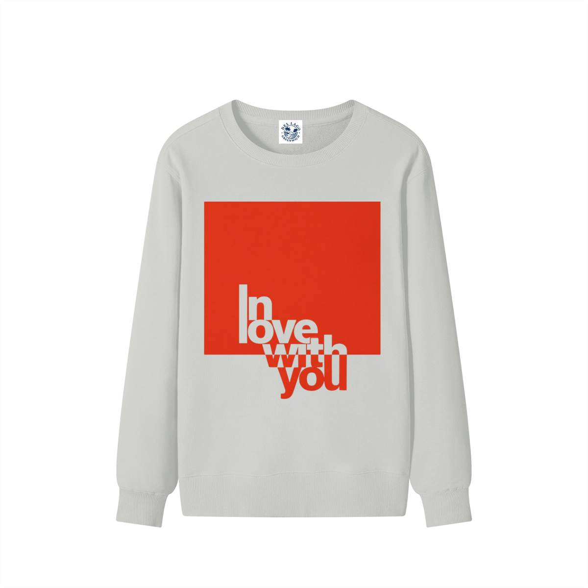 A light gray crewneck sweatshirt featuring a bold graphic on the front with a large red square and the words 'In love with you' in white and red text, displayed on a clean white background.