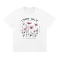 White Grow Wild graphic t-shirt featuring nature-inspired artwork celebrating growth, freedom, and wild beauty.
