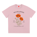 Pink Grow Wild graphic t-shirt featuring nature-inspired artwork celebrating growth, freedom, and wild beauty.