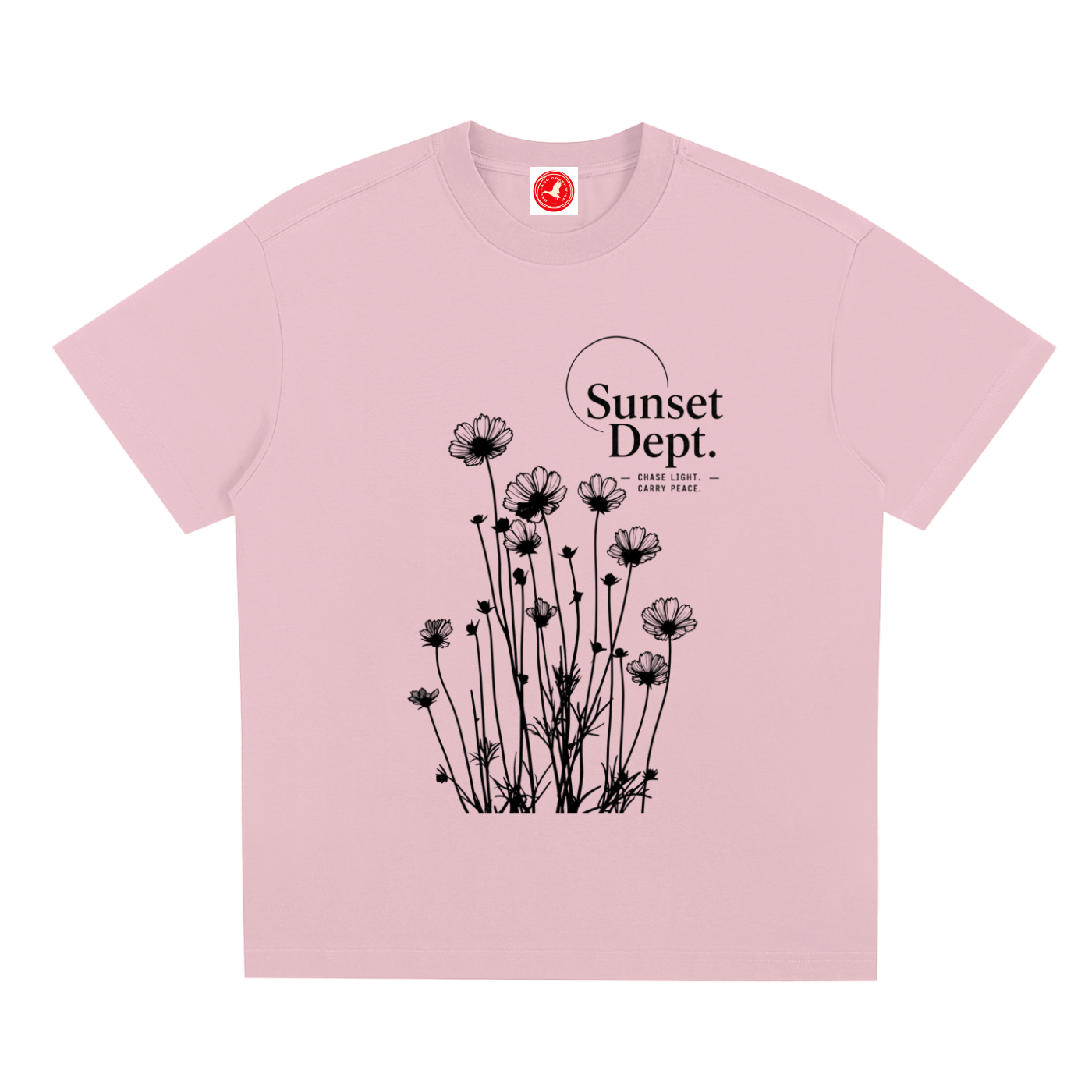 Pink Graphic t-shirt featuring sunset-inspired artwork celebrating relaxed coastal living and everyday adventure.